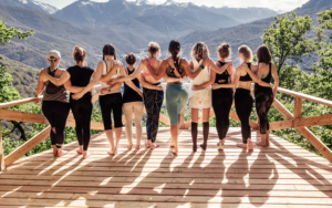 A Group of Woman Standing Together Practicing Social Wellness